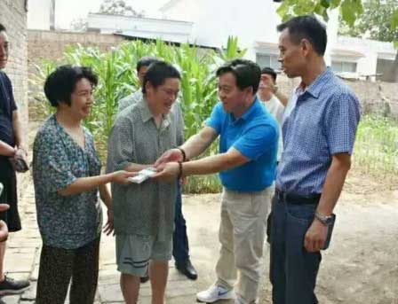丁栾镇官路西村帮扶.jpg